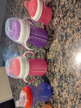 Lightly used milk bottles